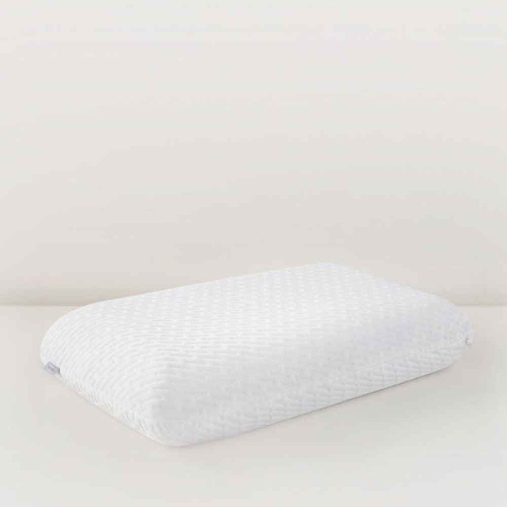 white foam pillow on beige background