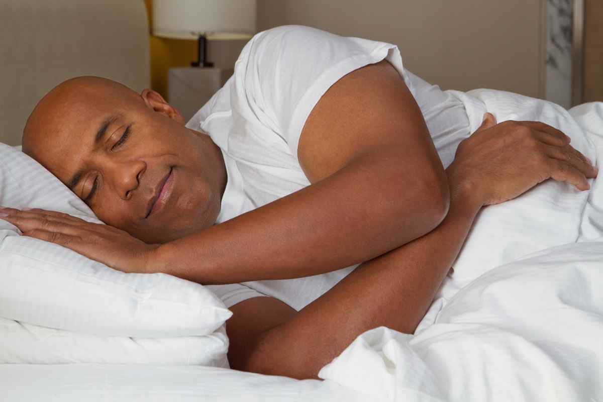 African American man fast asleep