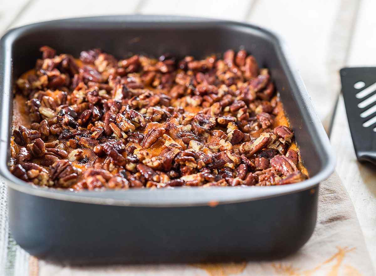 baking tray of sweet potato casserole with pecans