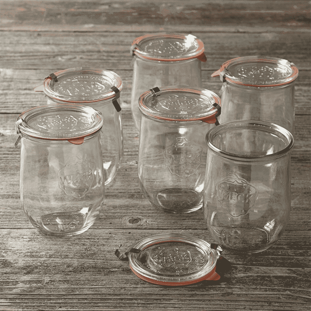 Set of glass jars on a wooden table