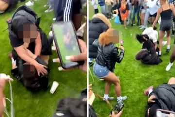 Frau im Hyde Park von Mann geschlagen, als Menge filmt und nichts tut