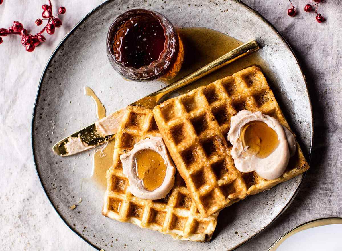 belgian waffles on plate with butter and preserves