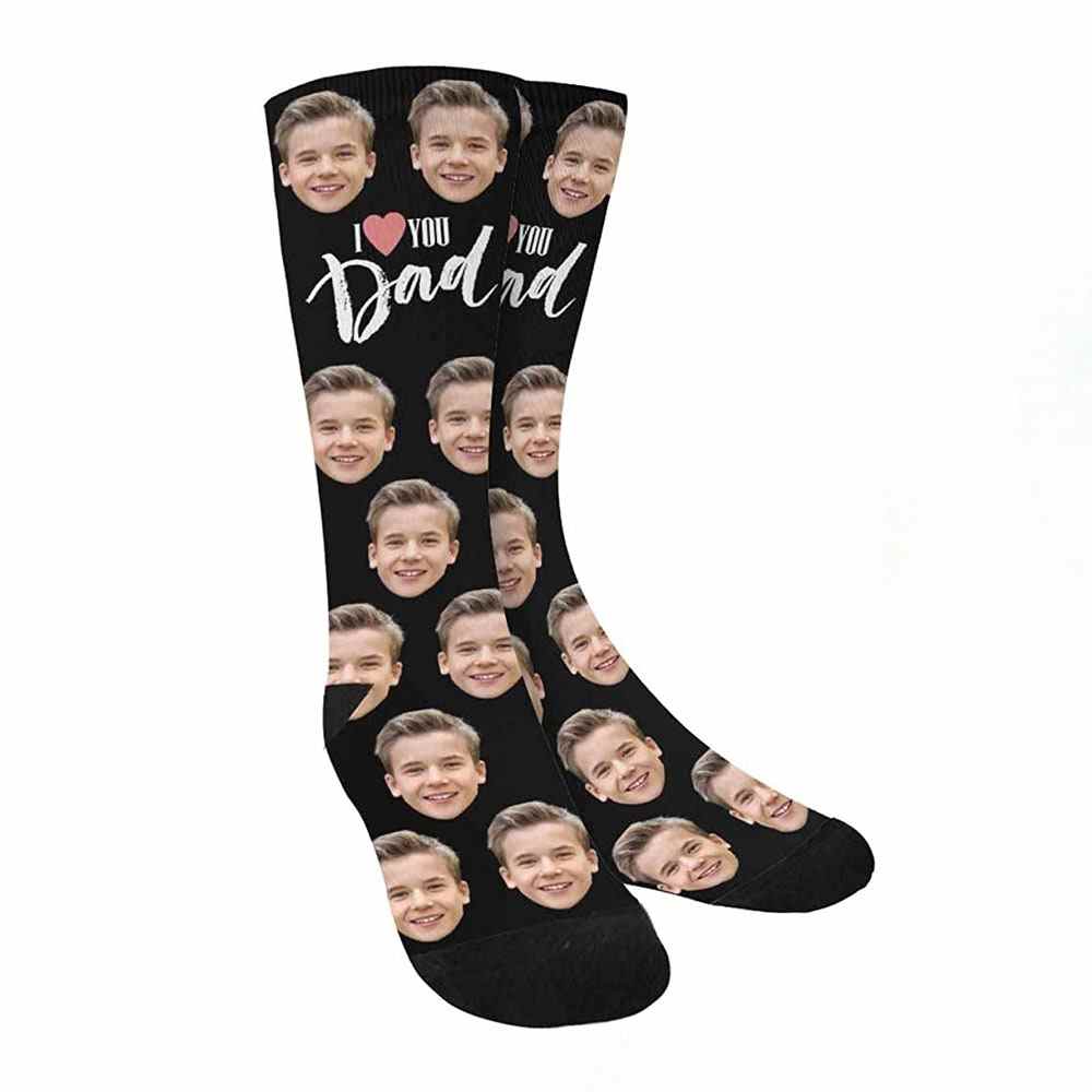 Mypupsocks Custom Face Socken in Schwarz mit mehreren Gesichtern eines Kindes auf weißem Hintergrund