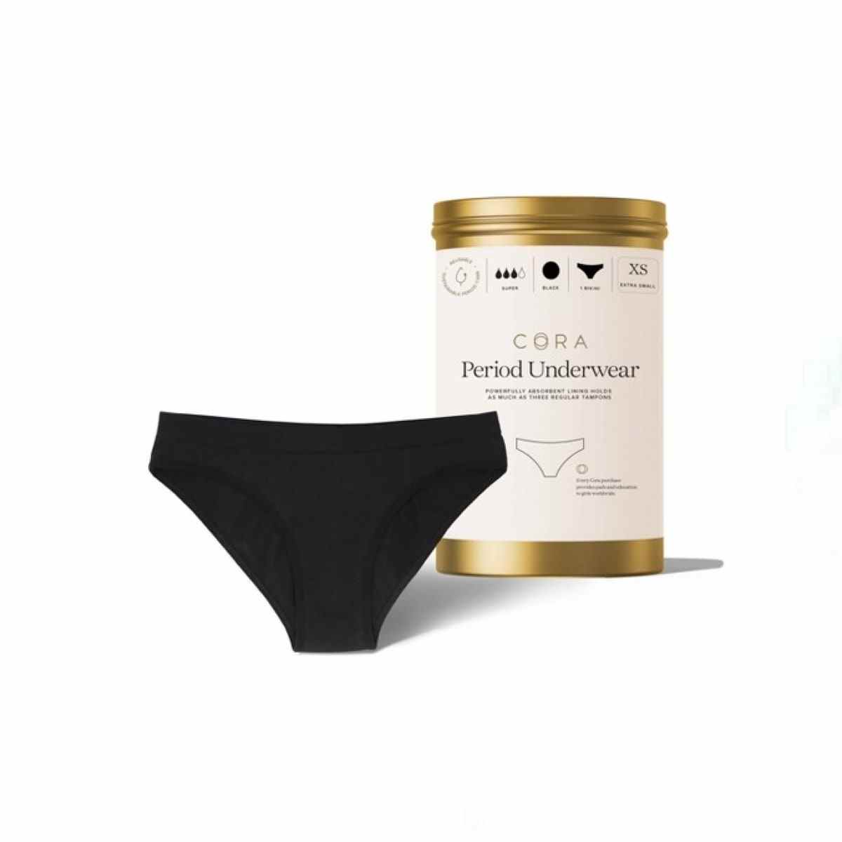 Schwarze Bikini-Unterwäsche aus der Cora-Periode und Golddose auf weißem Hintergrund