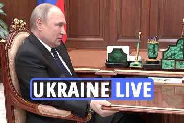 Das Video zeigt den Despoten Putin, der fest am Tisch greift, während er behauptet, er habe Parkinson