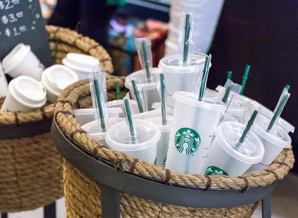 Starbucks reusable cups and straws in a basket