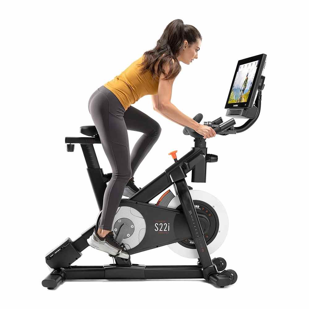 Woman using an indoor exercise bike