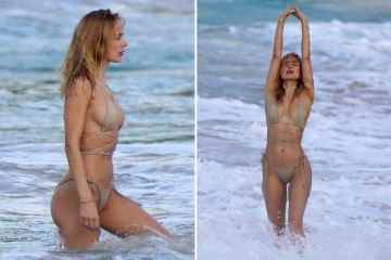 Kimberley Garner begeistert, als sie sich im Riemchen-Bikini am Strand dehnt