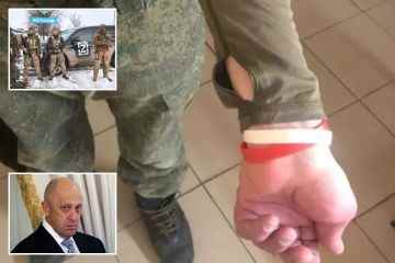 Russische Söldner tragen aus erschreckenden Gründen mysteriöse Armbänder