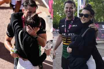 Mark Wright umarmt und küsst Frau Michelle an der Ziellinie des London-Marathons