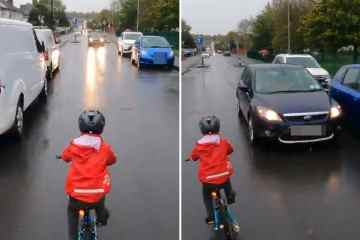 Beobachten Sie, wie das Auto in die Nähe eines Fahrradfahrers kommt - aber wer hat Unrecht?
