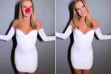 Amanda Holden trägt keinen BH, als sie in einem weißen Minikleid und einer roten Nase posiert 