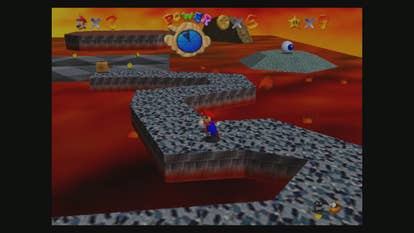 Beste Mario-Spiele - Screenshot von Super Mario 64, der Mario zeigt, wie er auf einem gepflasterten Weg durch Lava läuft.