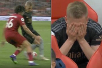 Zinchenko scheint nach dem Ausgleich von Liverpool auf der Arsenal-Bank in Tränen aufgelöst zu sein