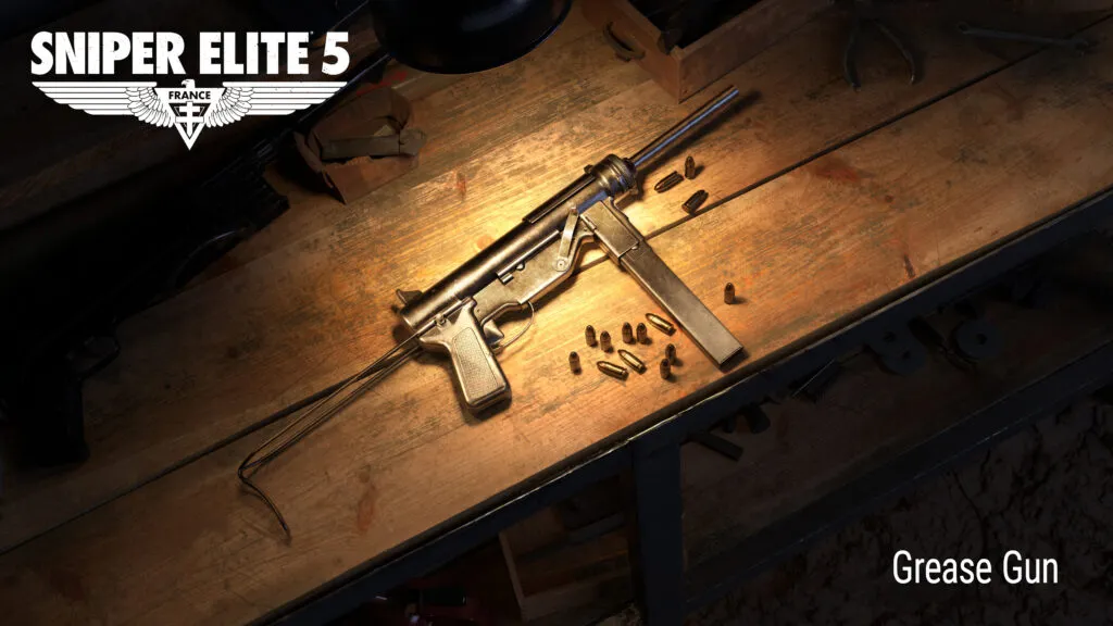 Eine Fettpistole liegt auf einer Werkbank, in deren Nähe Kugeln verstreut sind.