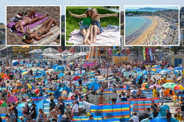 Die Briten strömen in Scharen an den Strand, um die herrliche 24 °C-Sonne zu genießen