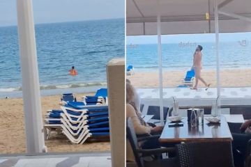 Bizarrer Moment: Tourist schlendert völlig nackt durch den überfüllten Strand von Benidorm