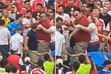 Beobachten Sie, wie ein Fan beim Massenkampf bei United gegen Arsenal von einem gegnerischen Unterstützer geschlagen wird