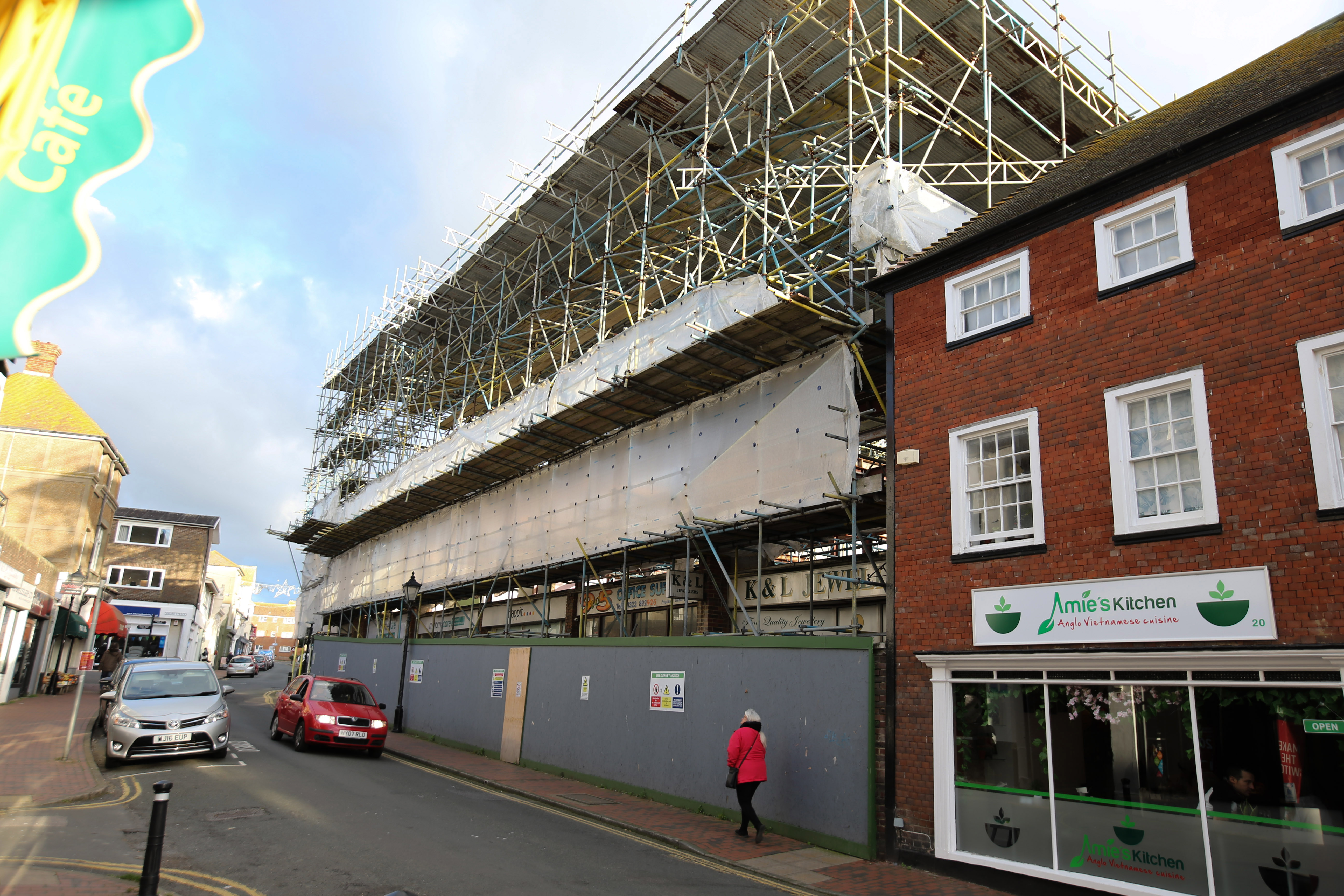 The metal structure towering over a high street must come down, a judge ruled