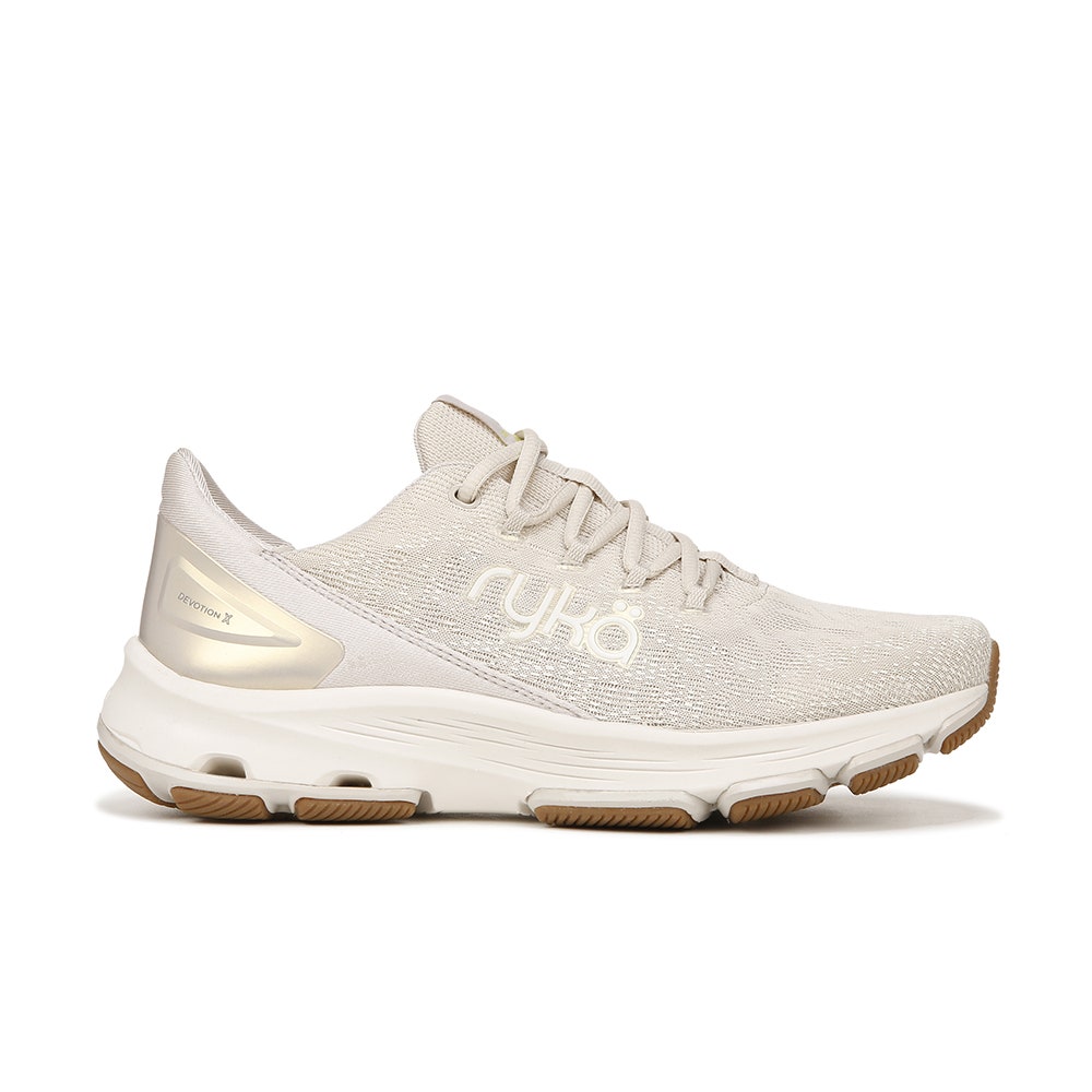White and gold walking shoe