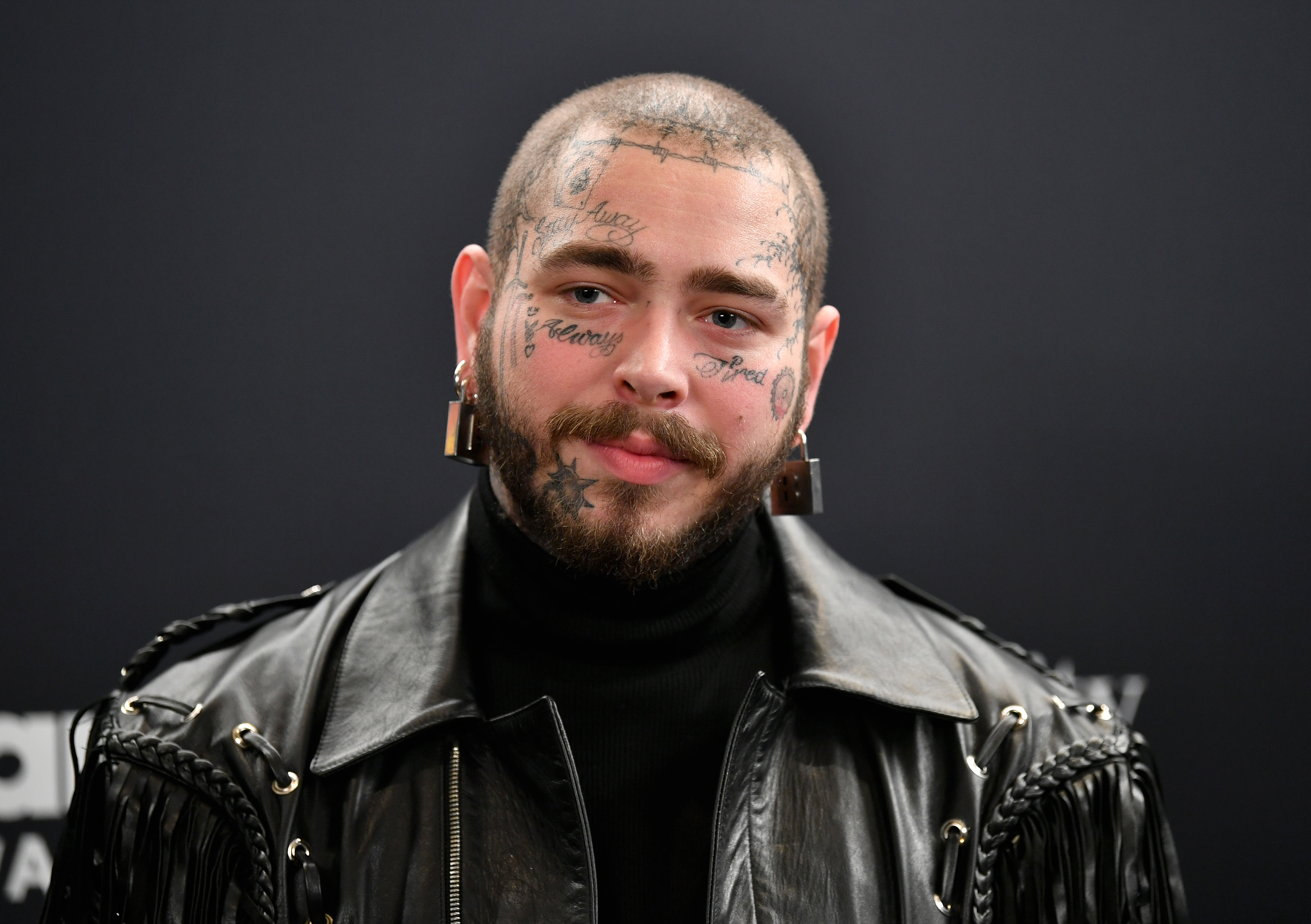 Becoming a dad has made Post Malone want to pause his career