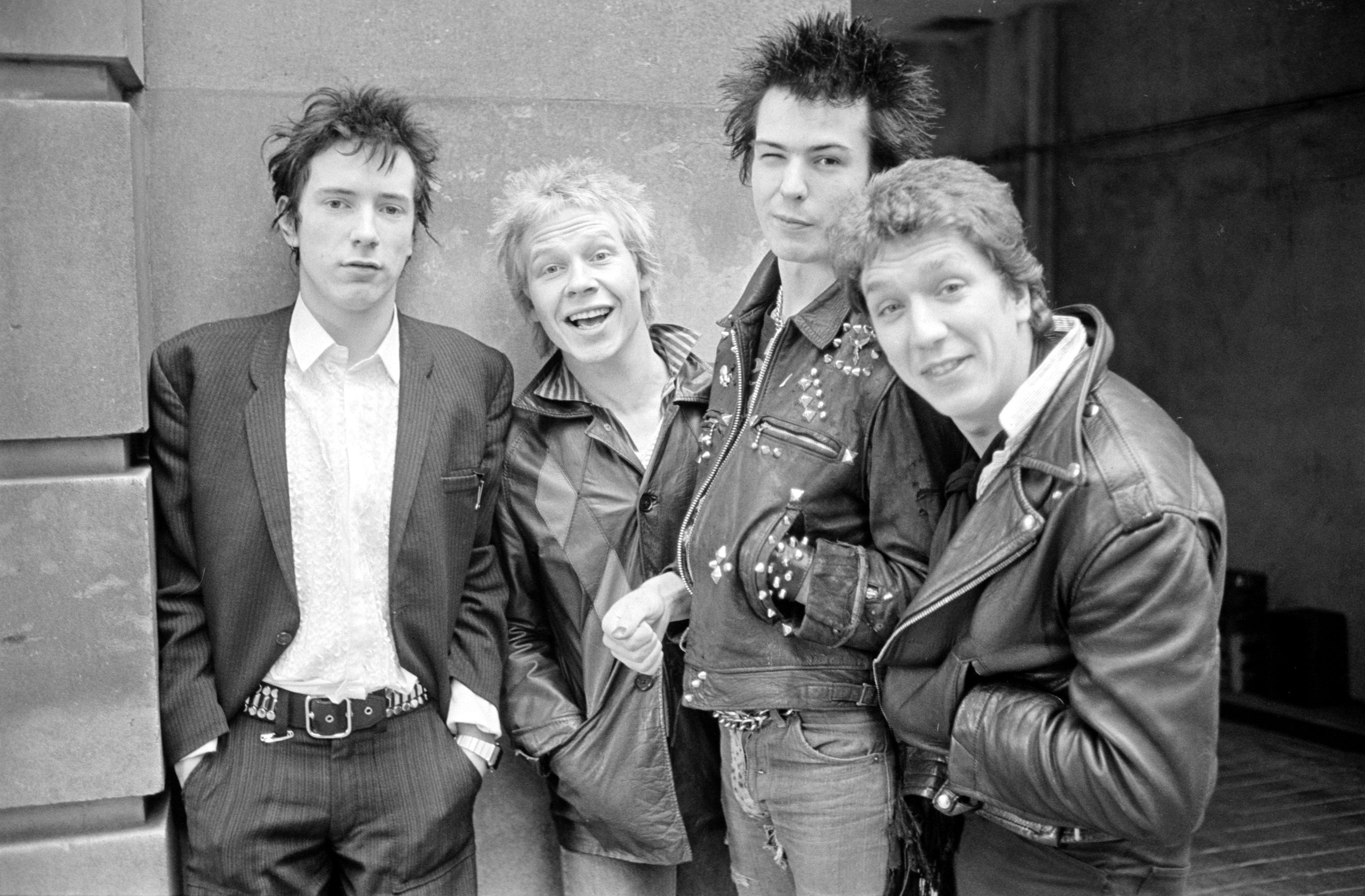 The singer has recently been in a bitter court battle with former Sex Pistols Paul Cook, second left, and Steve Jones, right