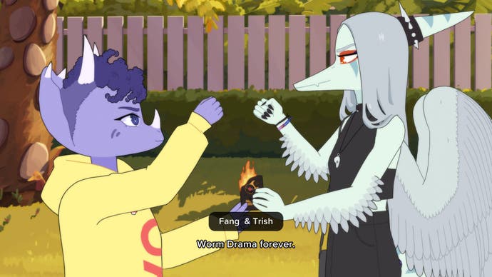 Der Screenshot von „Goodbye Volcano High“ zeigt zwei Teenager-Dinosaurier, die bei einem Ritual vor dem Bandauftritt eine Visitenkarte verbrennen