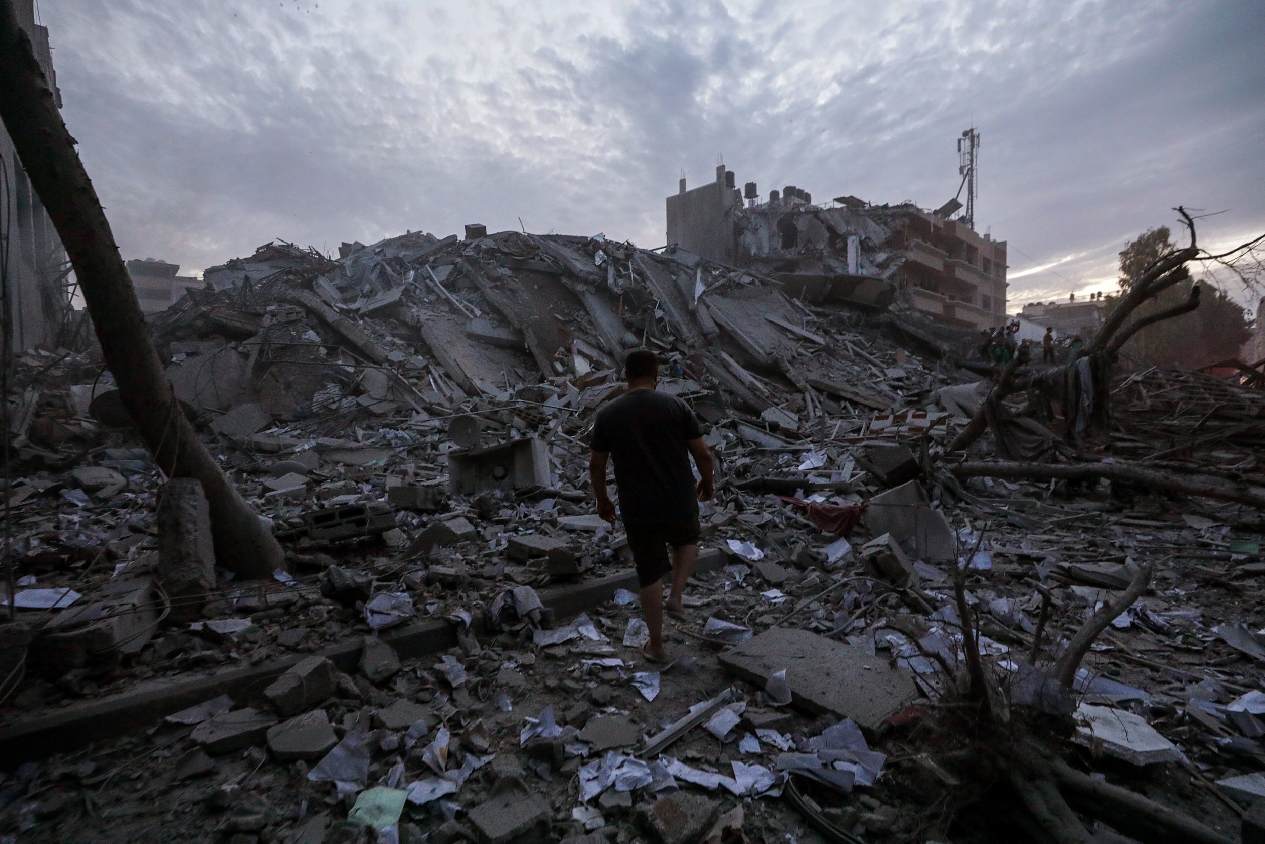 The Palestine Tower was left in ruins after Israeli warplanes targeted late yesterday