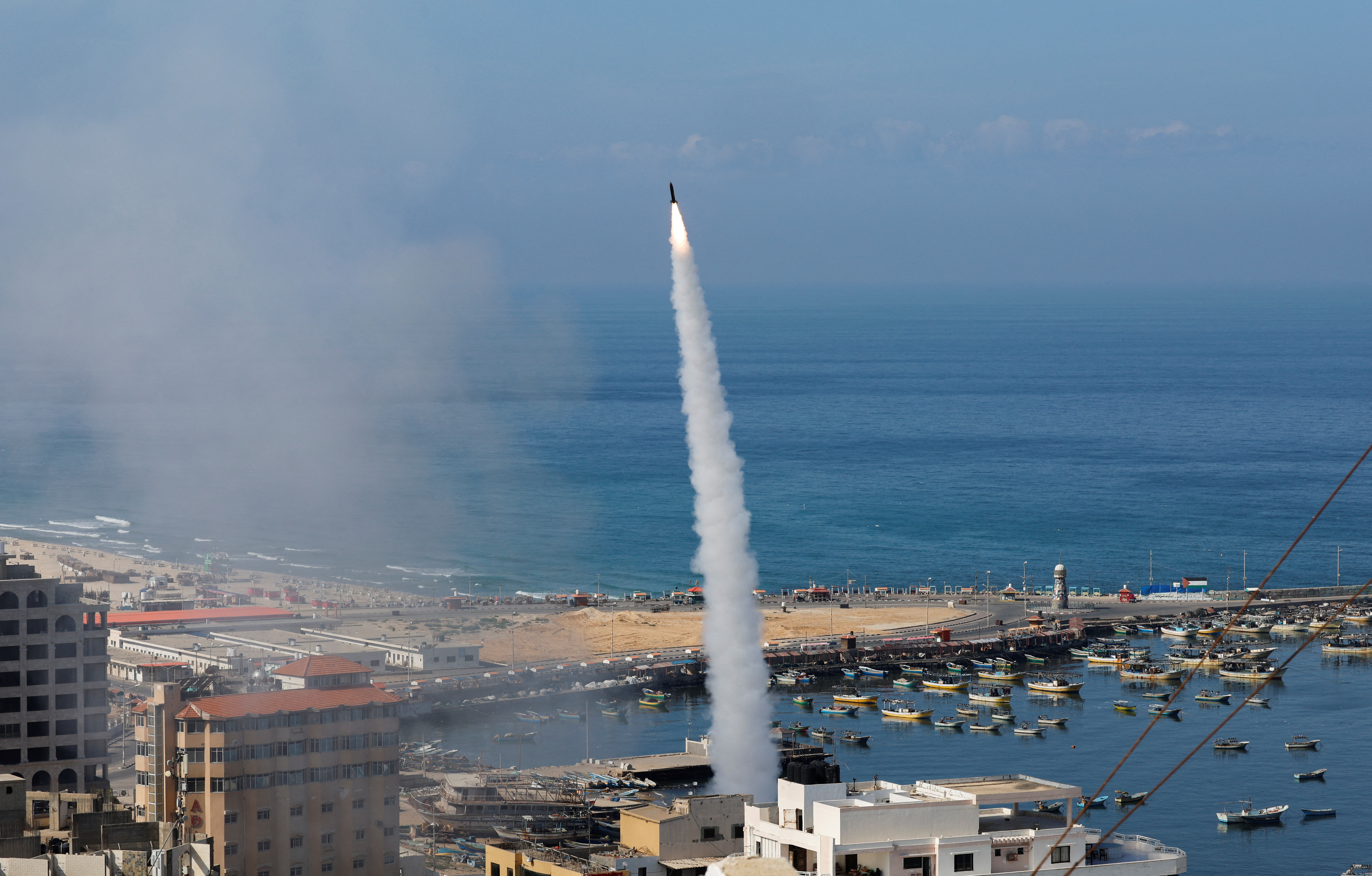 Thousands of rockets were fired by Palestinian militants into Israel early Saturday morning