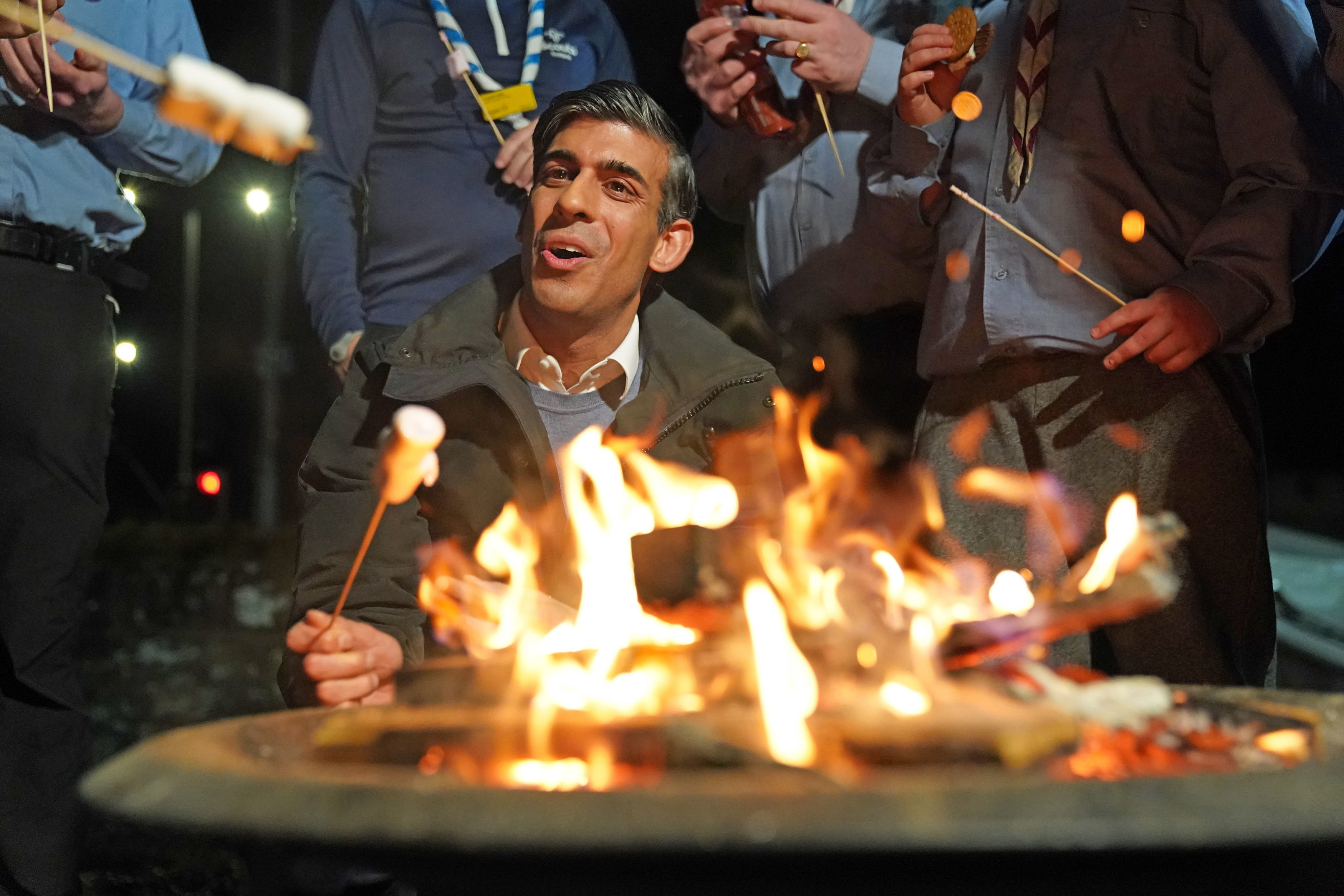 January, 2023: Rishi toasts marshmallows during a visit to Sea Scouts near Inverness, as part of a two-day visit to Scotland to boost the Union