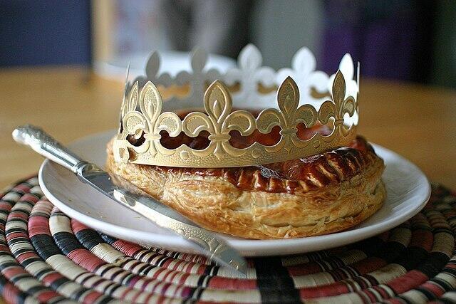 A galette de roi with paper crown.