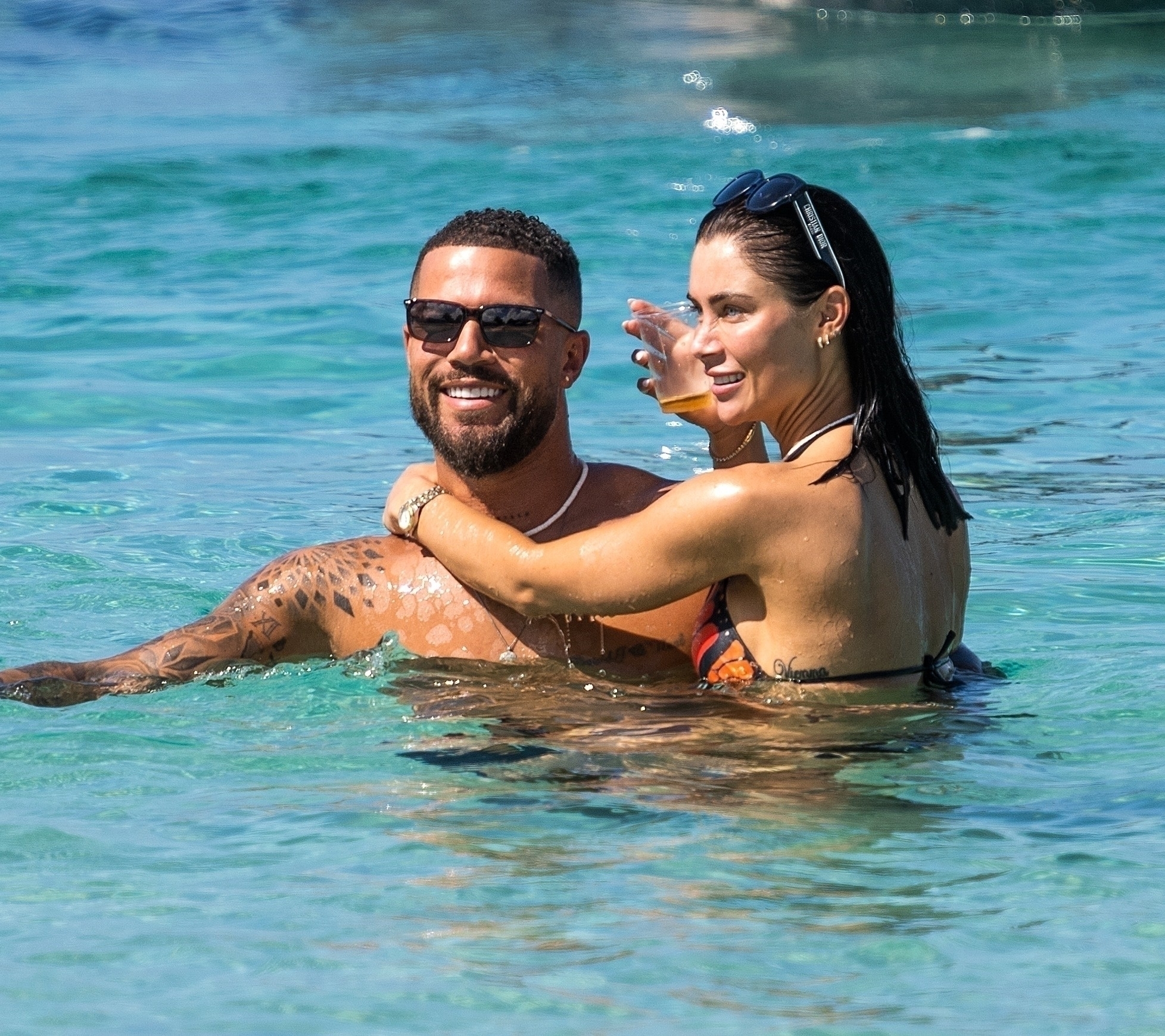 Die exklusiven Schnappschüsse der Sun zeigen ihren idyllischen Strandurlaub mit ihrem Verlobten DJ O'Neal nach einer „schwierigen“ Woche