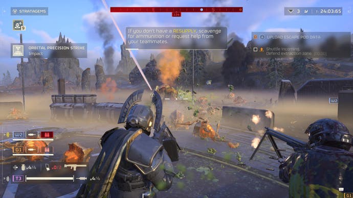 Screenshot von Helldivers 2, der den Spieler und einen Verbündeten zeigt, wie sie schwere Maschinengewehre auf eine entgegenkommende Welle von Roboterfeinden abfeuern