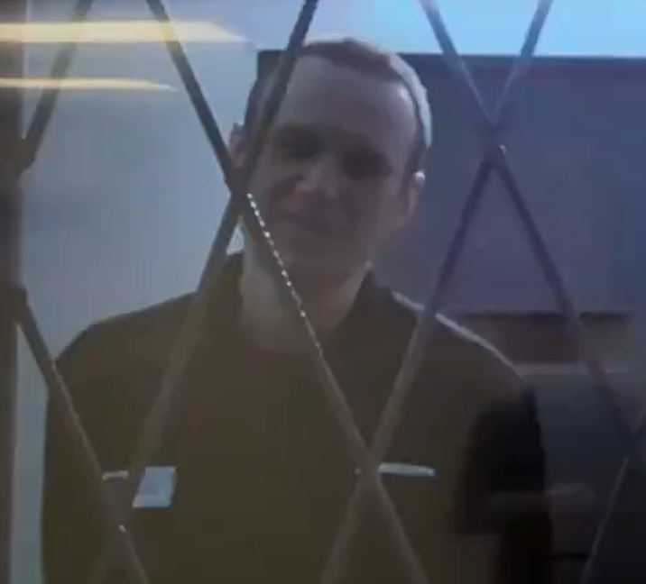 The last picture of Navalny behind bars in Russia - appearing via video link in court yesterday