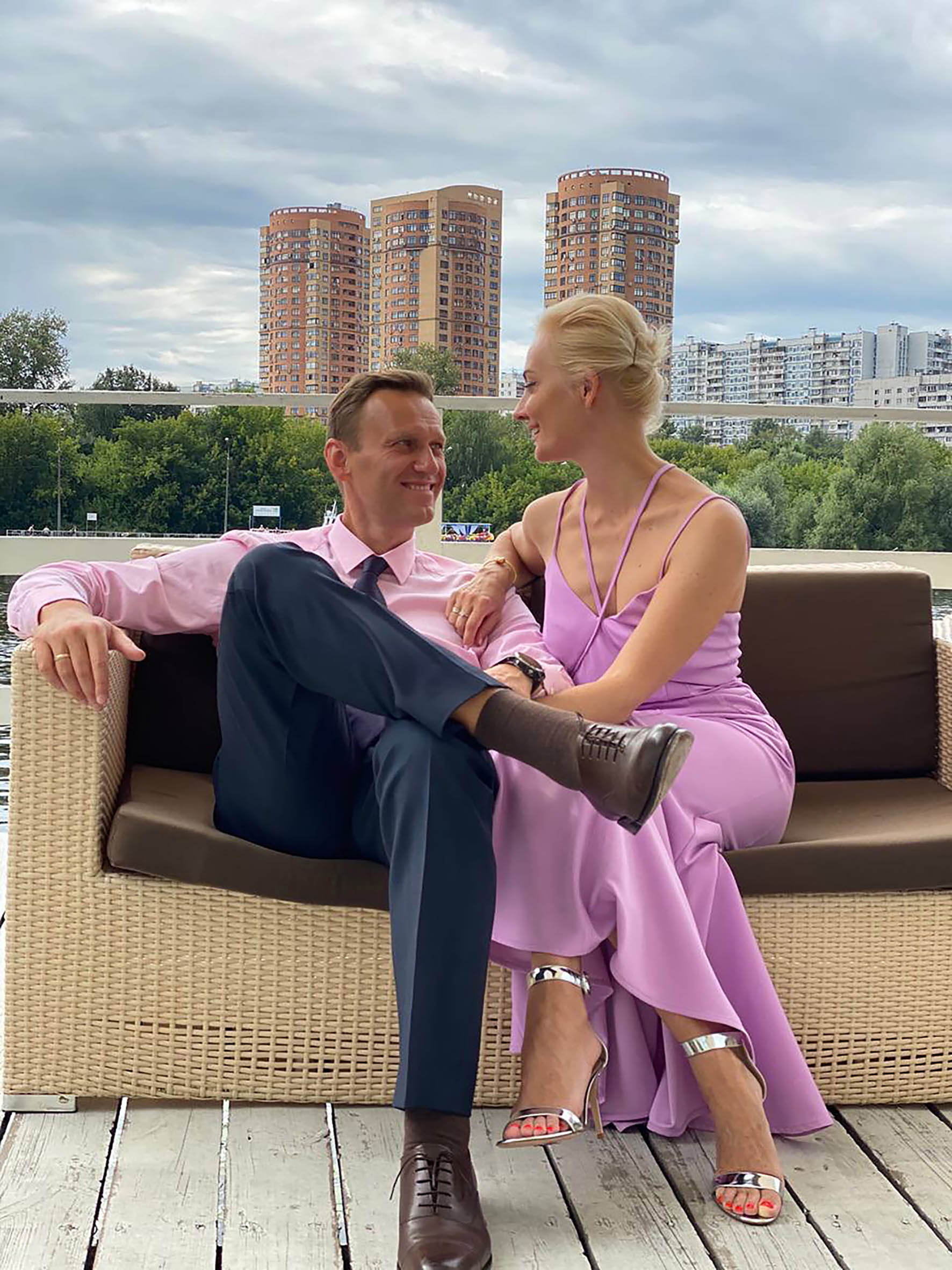 Navalny with his wife Yulia - with whom he shares two children