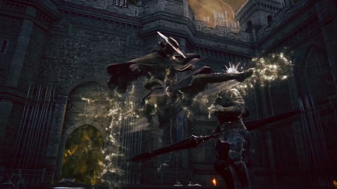 Spielerfigur mit Hut und Umhang tritt einen Soldaten in der Luft, wobei Gischt herausspritzt