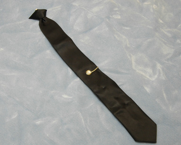 Cooper's tie is one of the few items of evidence remaining in the case