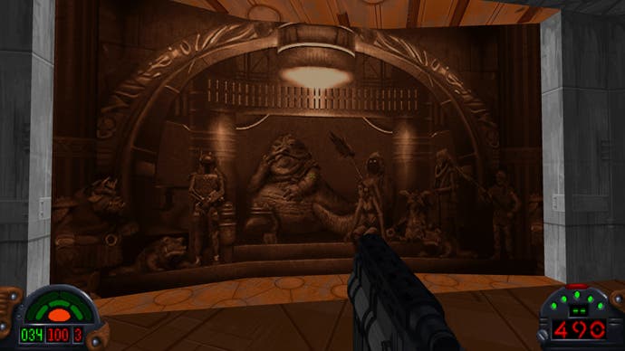 Blick auf einen Sockel an der Wand, in dessen Mitte Jabba the Hutt abgebildet ist.