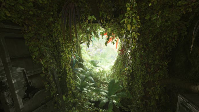 Avatar: Frontiers of Pandora-Screenshot, der einen Tunnel zeigt, der in ein herrliches, üppiges Paradies führt.