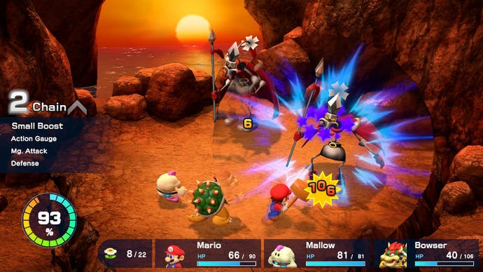 In diesem Screenshot aus Super Mario RPG findet ein Bosskampf statt.  Mario und sein Team kämpfen gegen zwei riesige, furchterregende Feinde, während Schadenseffekte ausgelöst werden.