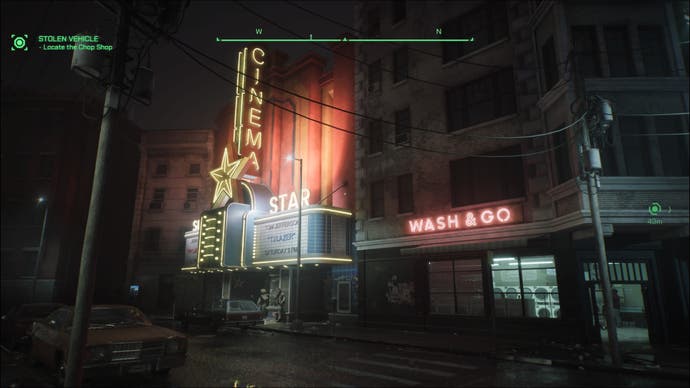 Ein Screenshot von RoboCop: Rogue City, der ein Kino und einen Waschsalon zeigt, die nachts durch ihre Neonreklamen beleuchtet werden.