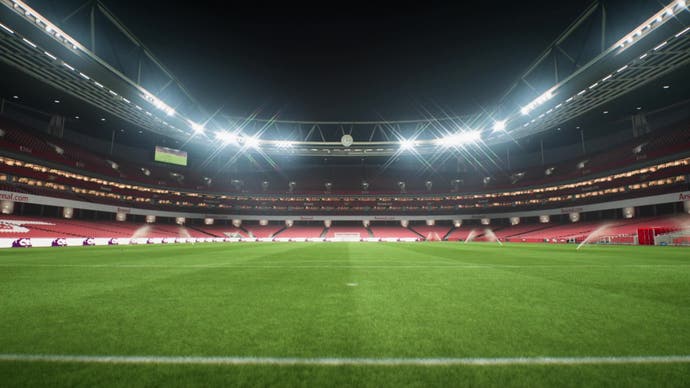 Screenshot von EA Sports FC 24, der eine Totalaufnahme des Emirates Stadium bei Nacht zeigt.