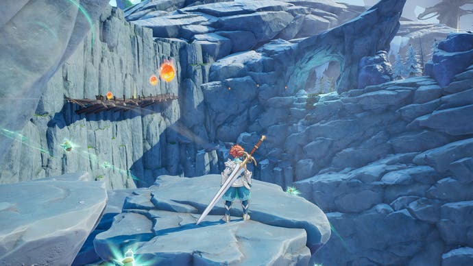Screenshot des Protagonisten von Visions of Mana, der auf einer felsigen Klippe in einer bergigen Gegend steht