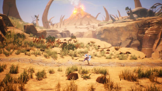 Screenshot von Tales of Kenzera, der den Spielercharakter zeigt, der seitwärts durch die Wüste rennt, mit einem Vulkan im Hintergrund