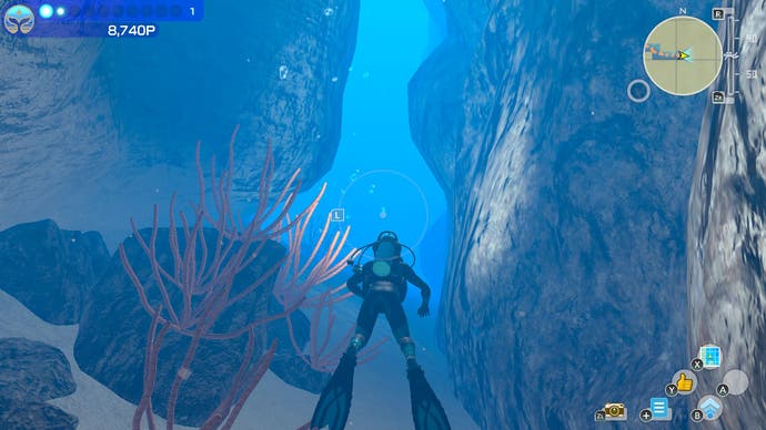 Ein Taucher erkundet in Endless Ocean Luminous eine Unterwasserschlucht