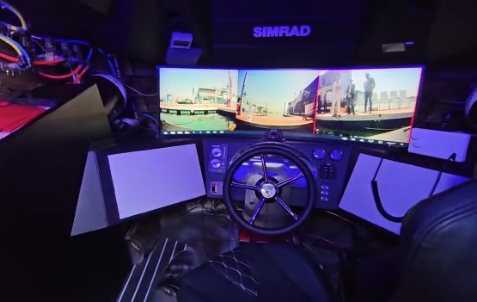 Der Ausblick aus dem Ein-Personen-Cockpit mit Bildschirmen, die Bilder projizieren